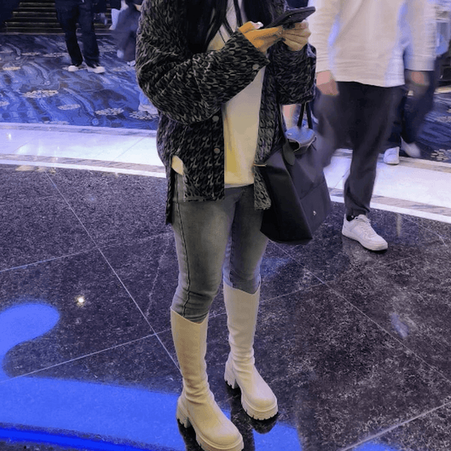 Woman in white boots candid crushing in cinema 5