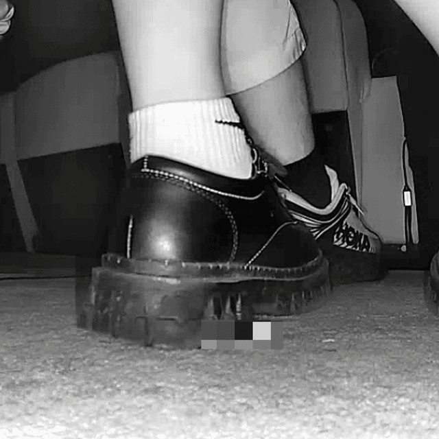 Woman in white socks and leather shoes with her boyfriend candid crushing at the cinema 2