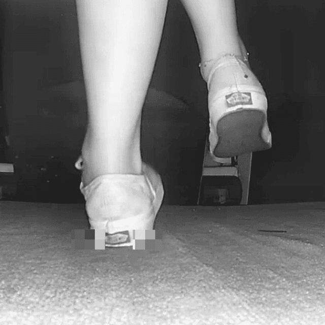 Woman in long skirt and Vans shoes candid crushing at the cinema 5