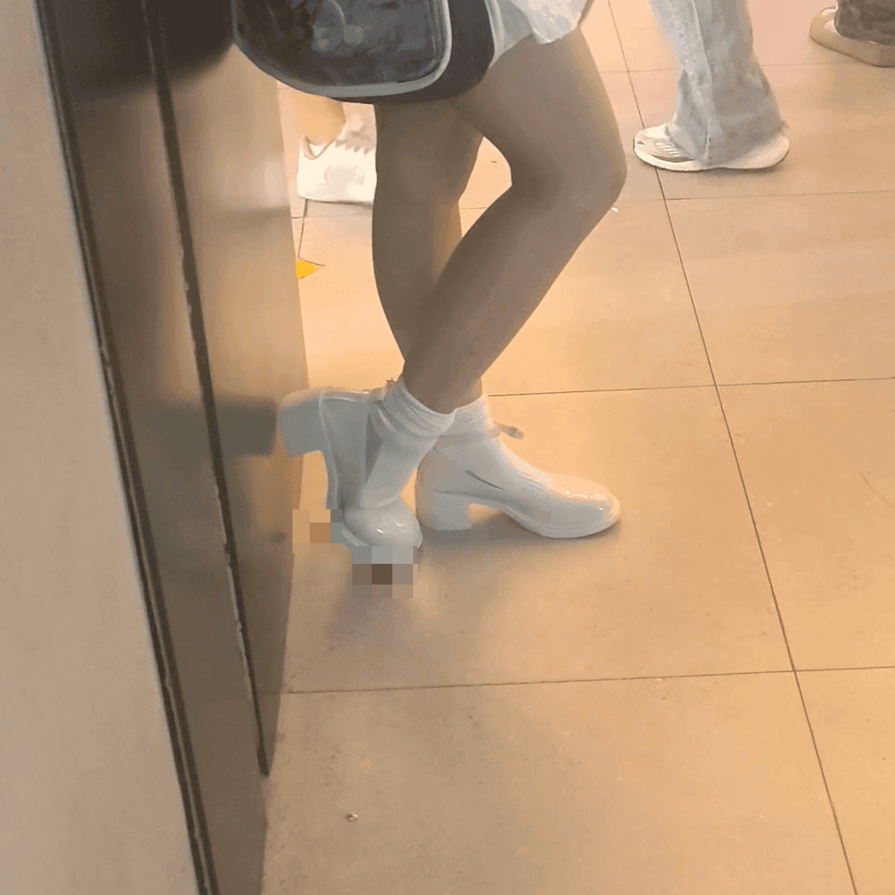 Cosplay girl in white socks and chunky heels candid crushing