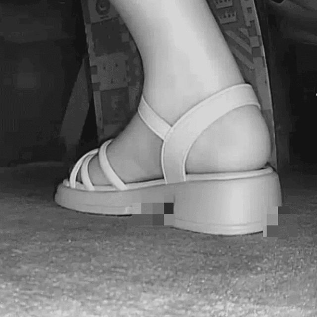 Women in movie theater candid crushing with white sandals 2