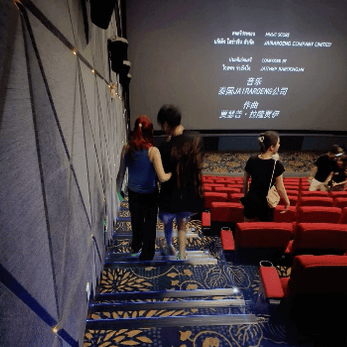 Woman in Alexander McQueen sneakers candid crushing in cinema thumb 5