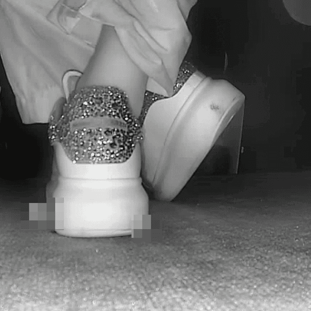 Woman in Alexander McQueen sneakers candid crushing in cinema 1