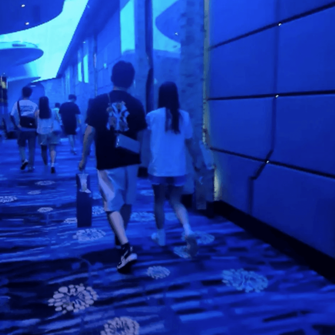 Woman candid crushing with white socks and Nike Air Force 1 in cinema thumb 3