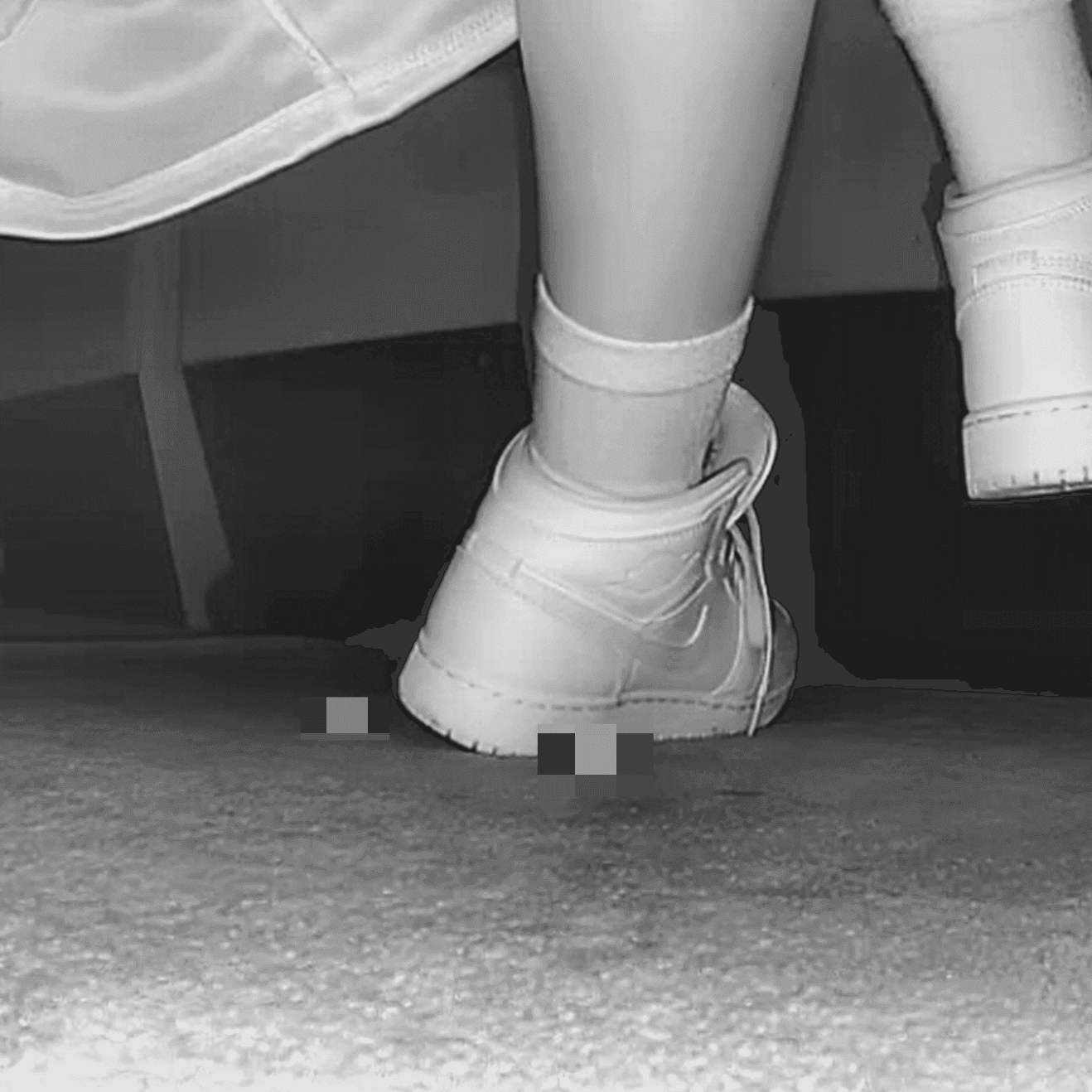 Woman at the cinema with white high-top Nike Air Jordan sneakers candid crushing thumb 3