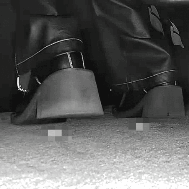 Woman in cinema candid crushing with block-heeled boots 5