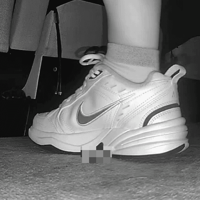 Woman in Nike Air sneakers candid crushing at the cinema 1